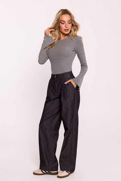 Stylish wide-leg cotton trousers by Moe, showcasing modern design elements like side pockets and a snap closure, crafted for ultimate comfort.