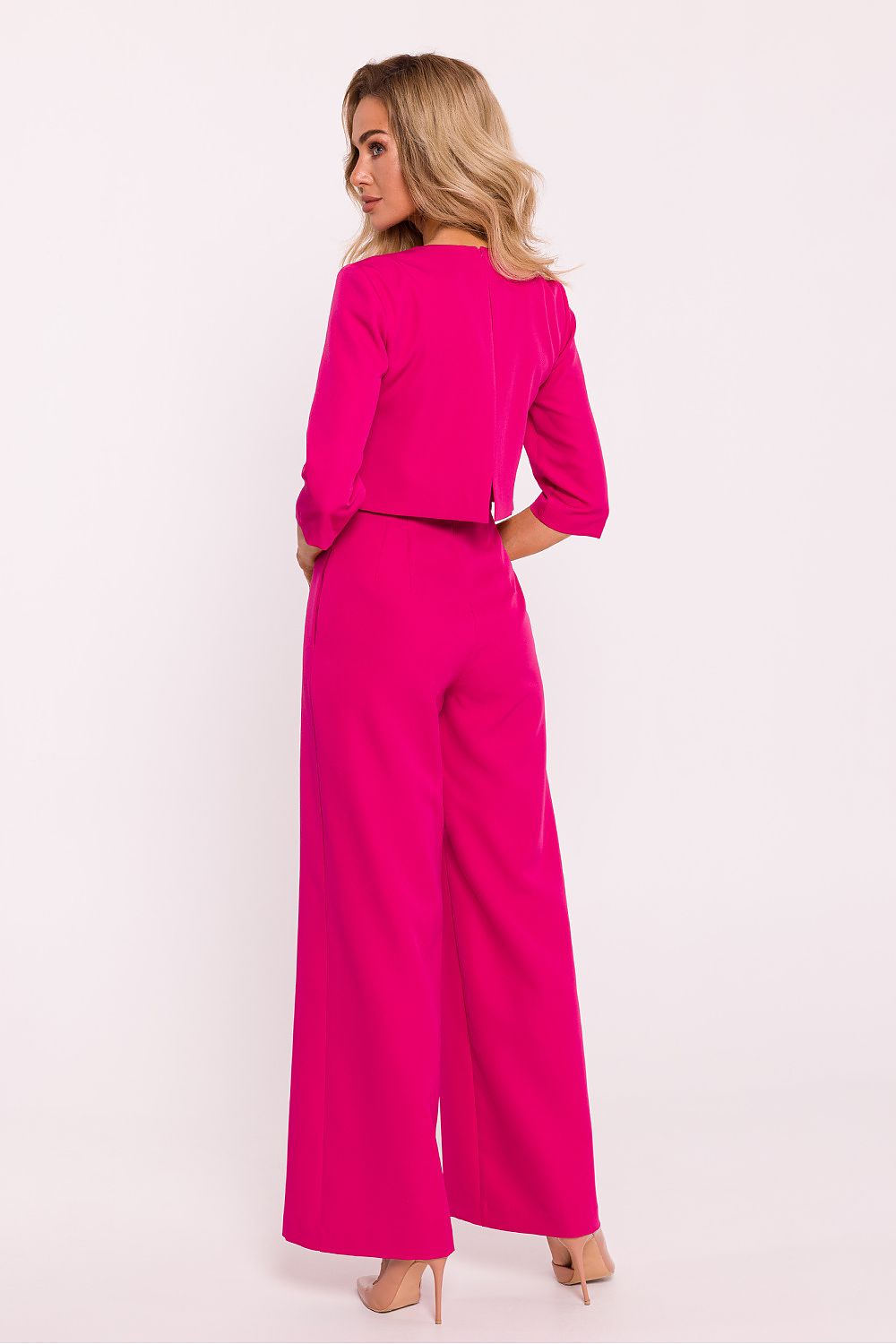 Elegant women's jumpsuit by Moe featuring wide legs and a double-layered top, perfect for a luxurious look.