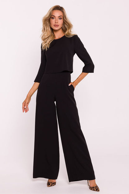 Side pockets of the elegant women's jumpsuit by Moe, illustrating practical yet sophisticated design.