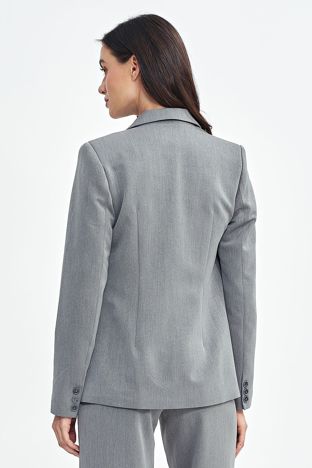 Stylish Nife blazer with imitation front pockets and hip-length cut, ideal for versatile and sophisticated outfits.