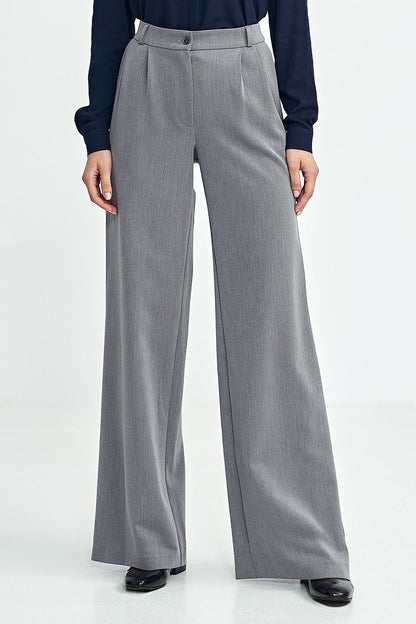 Elegant women's wide leg trousers with pleats for a luxurious fit, designed by Nife, showcasing a modern style and comfortable medium waist perfect for any stylish wardrobe.