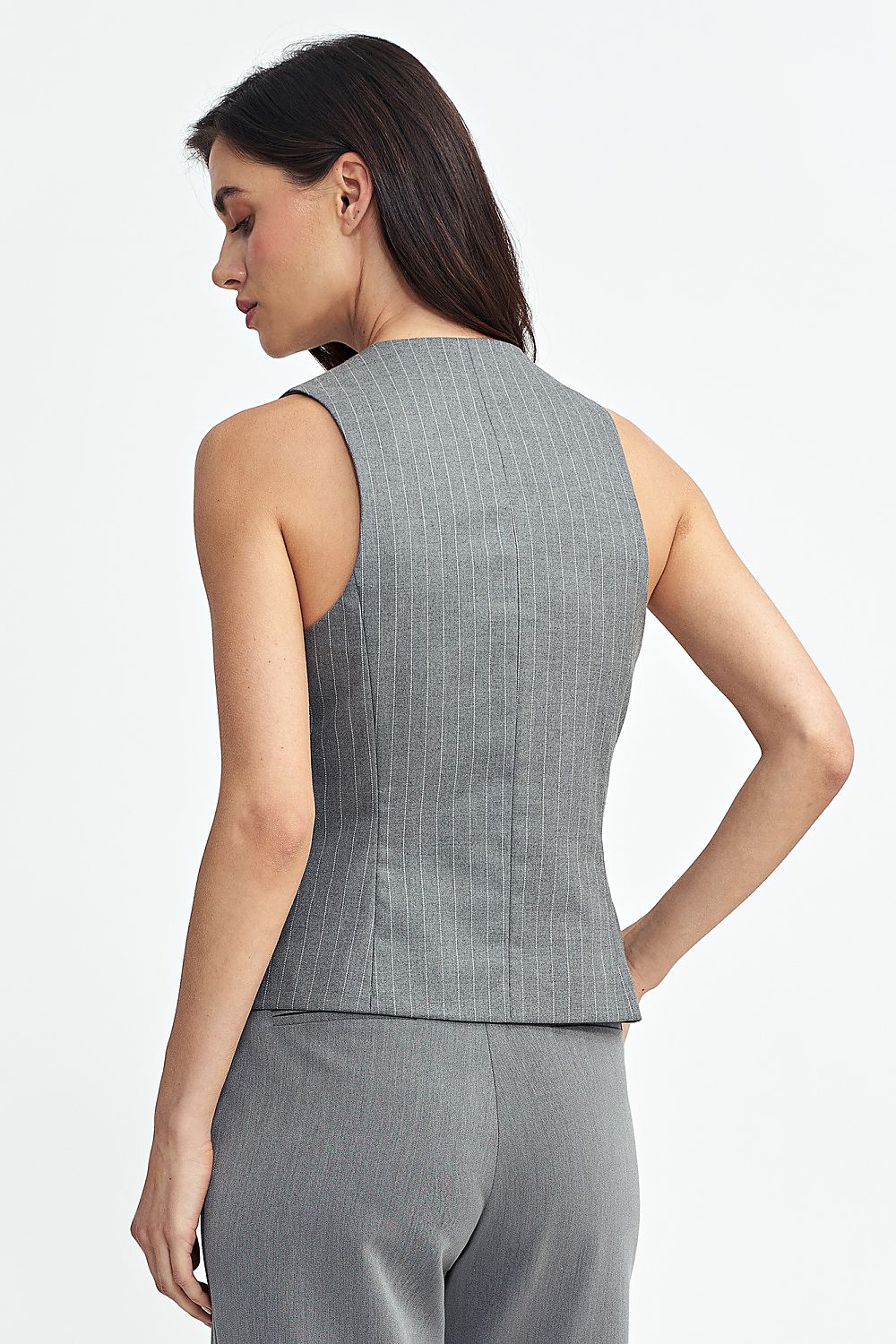Luxurious Nife vest crafted from high-quality materials, offering an elegant silhouette with subtle stripe details.