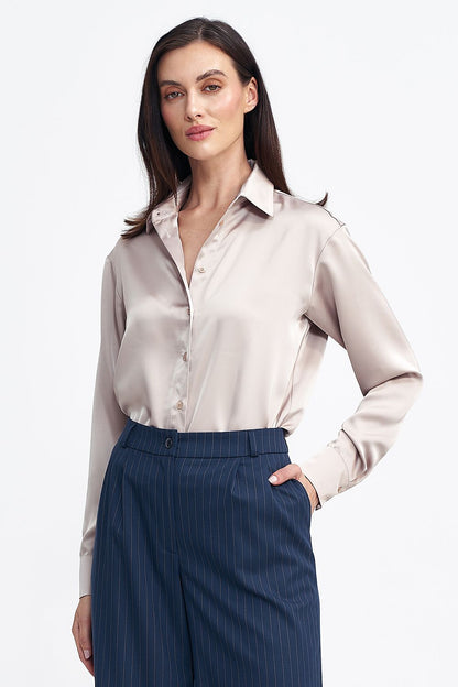 Stylish and timeless long-sleeve body by Nife, crafted from luxurious satin-like fabric, ideal for an elegant wardrobe.