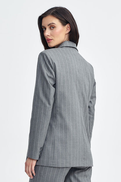 Stylish tennis-style striped fabric of the Nife oversized blazer, showcasing luxury craftsmanship and chic silhouette.