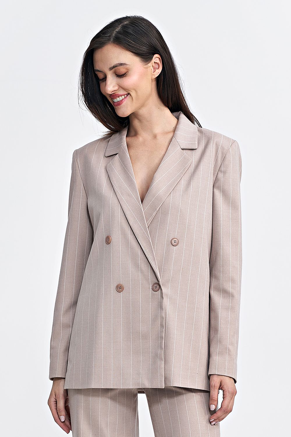 Luxury oversized blazer by Nife featuring elegant tennis-style stripes and double-breasted closure, perfect for chic outfits.