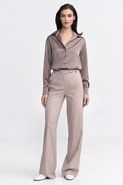 Full view of Nife's women's bootcut trousers, highlighting the flattering bootcut leg design and elegant fit for a chic look.