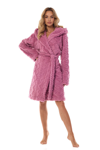 Elegant women's robe in plush quilted material by L&L Collection, showcasing practical pockets, stylish tie waist, and long sleeves, ideal for comfort and class.
