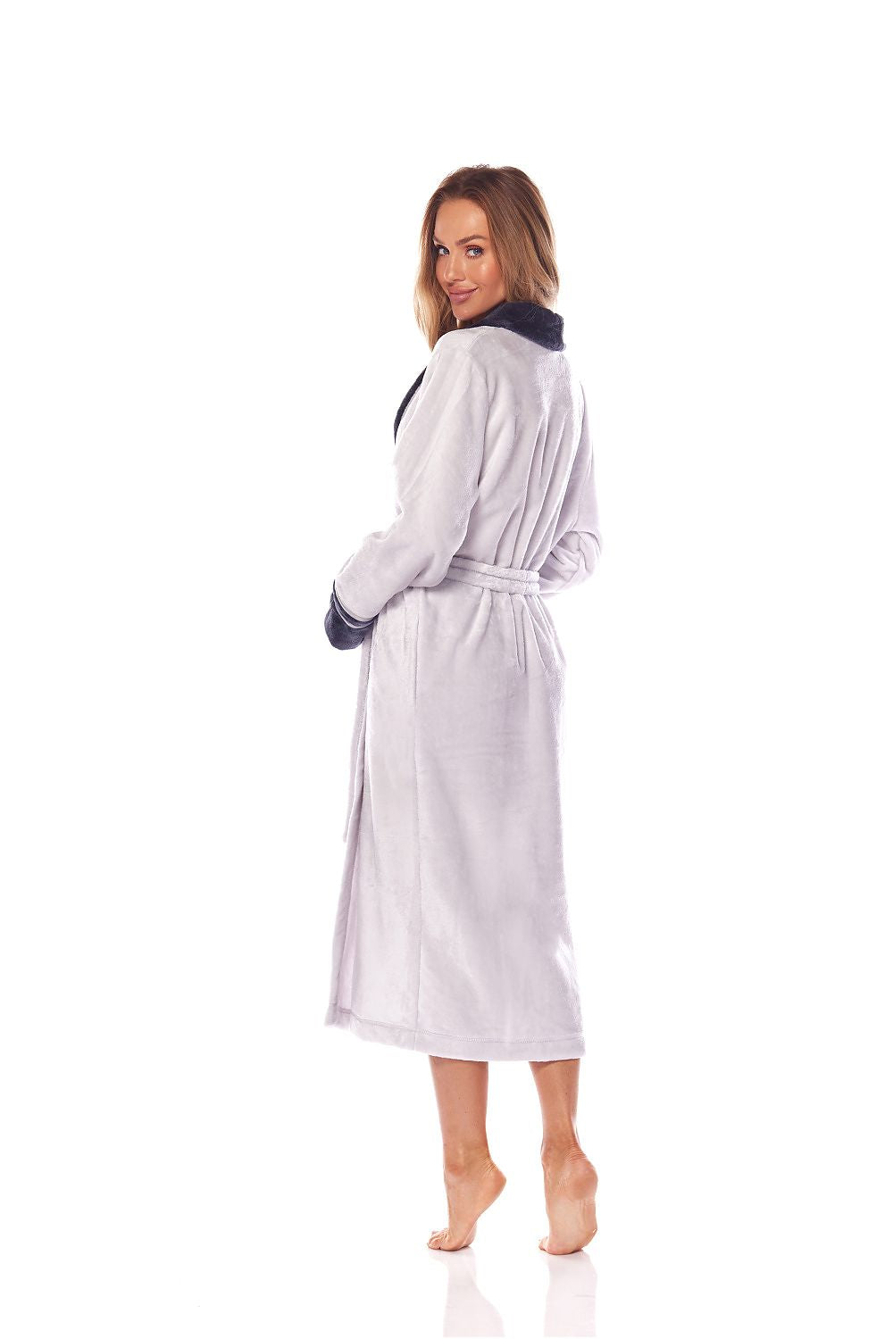 Beautifully crafted women's bathrobe by L&L Collection, showcasing a comfortable fit with side pockets and sophisticated design elements.