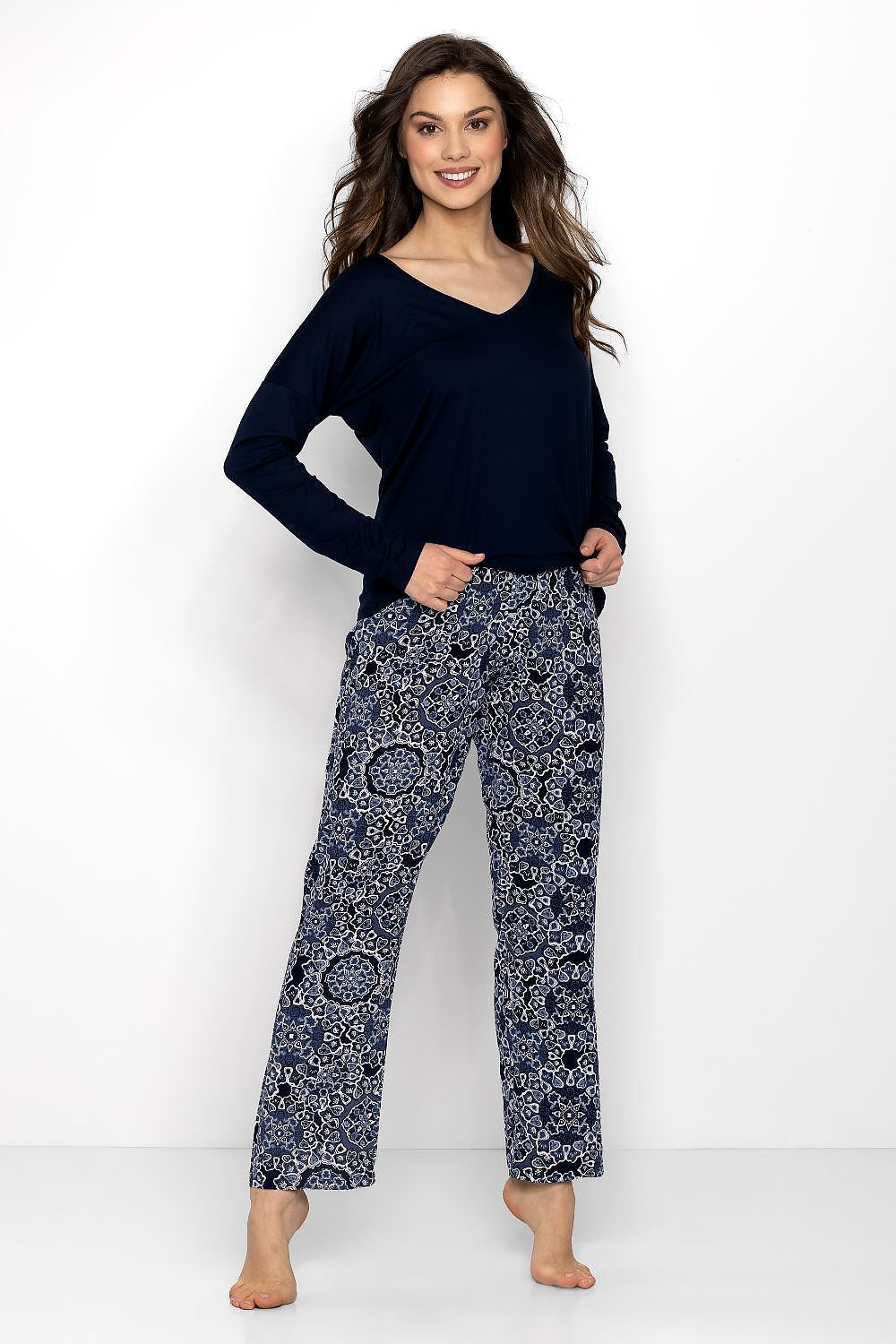 Elegant Women's 2-Piece Pajama Set by Momenti Per Me featuring a soft V-neck blouse and comfortable trousers, ideal for luxury sleepwear and homewear.