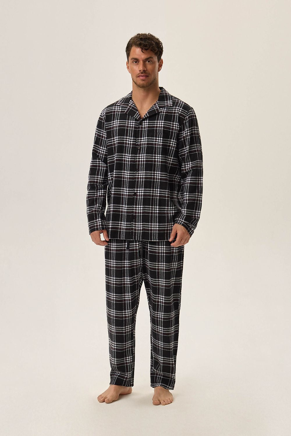 Henderson Men's HONOR 2 Cotton Pyjamas Set featuring a classic checkered design, showcasing a luxurious long-sleeved collared shirt and loose-fitting long pants for ultimate comfort.