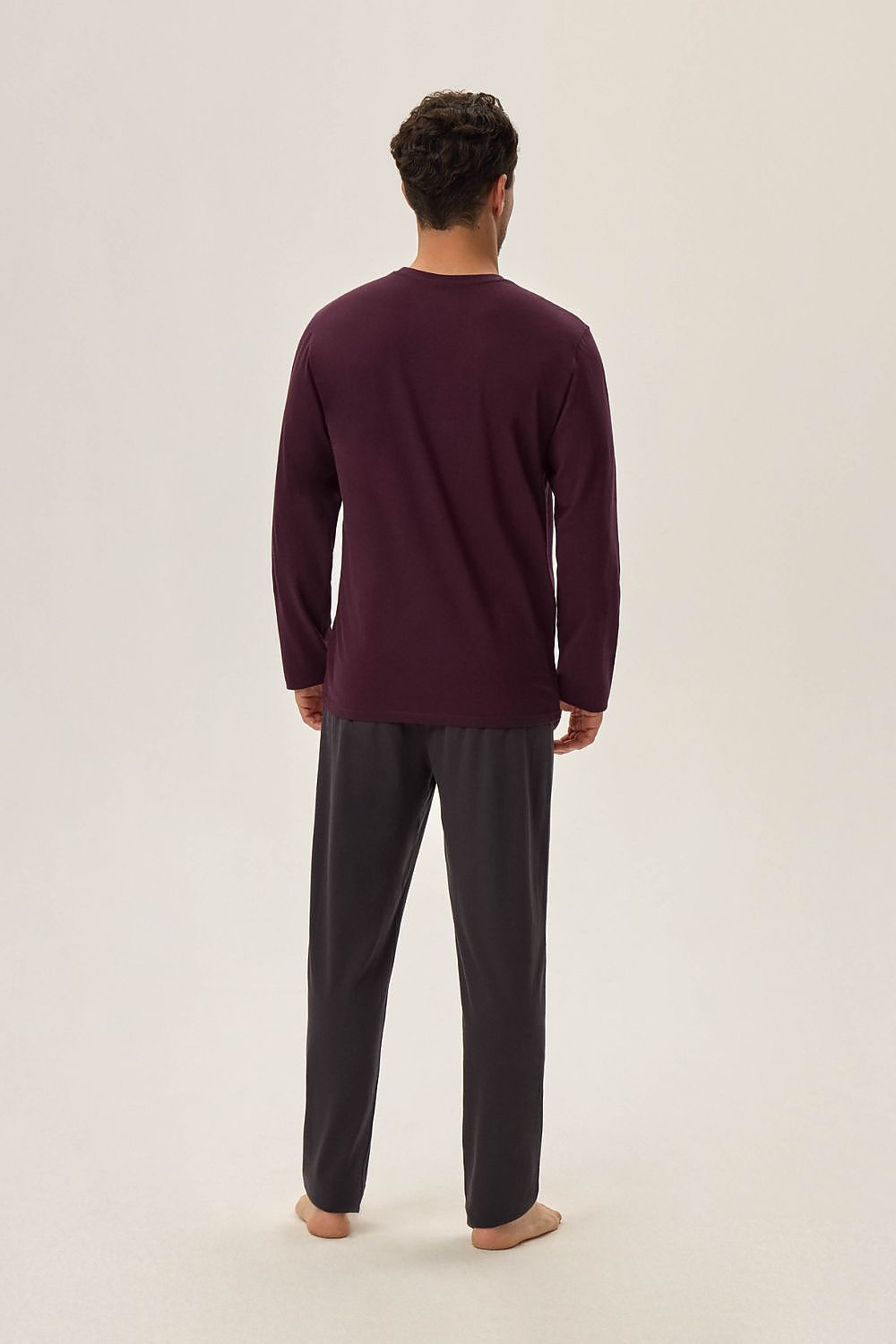 Elegant Henderson pajama set in deep burgundy, crafted from soft cotton knit fabric for a perfect fit and cozy silhouette.