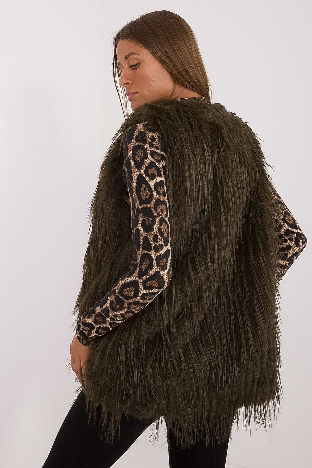 Stylish layering with AT's women's fur vest, made from premium polyester for ultimate comfort and sophistication.