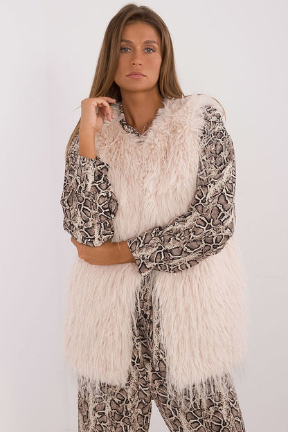 Beautifully designed women's fur vest by AT, perfect for layering, showcasing a modern and elegant casual style.