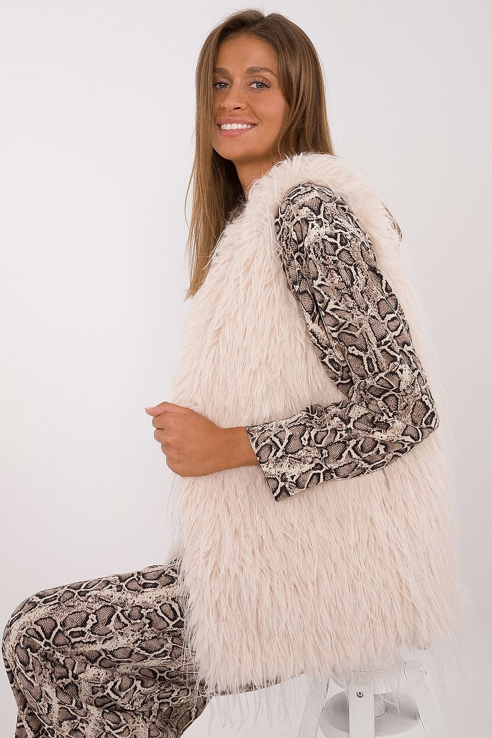 AT's luxurious casual fur vest for women, featuring a sleek silhouette and soft polyester for an exquisite look.
