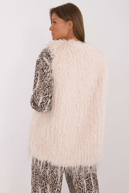Sophisticated women's fur vest by AT, ideal for cooler days, combining elegance and comfort in a chic design.