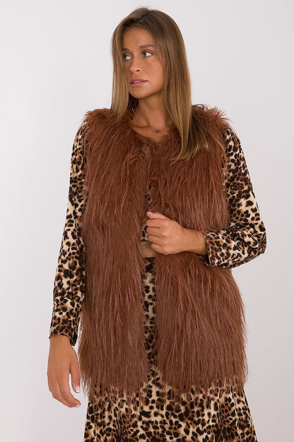 Stylish hook closure on the luxurious AT women's fur vest, perfect for sophisticated casual outfits.