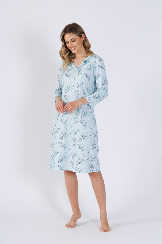 Elegant M-Max nightshirt in 100% cotton featuring V-neck and decorative bow, perfect for stylish and comfortable sleep.