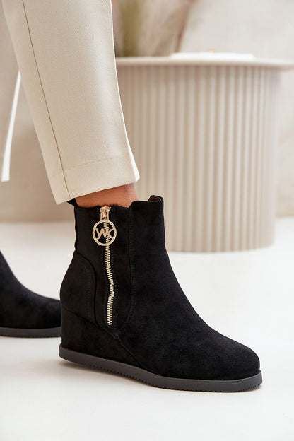 Step in Style's luxury women's boots made of eco suede, designed with a modern wedge heel and lined with plush fleece for comfort during cold weather.