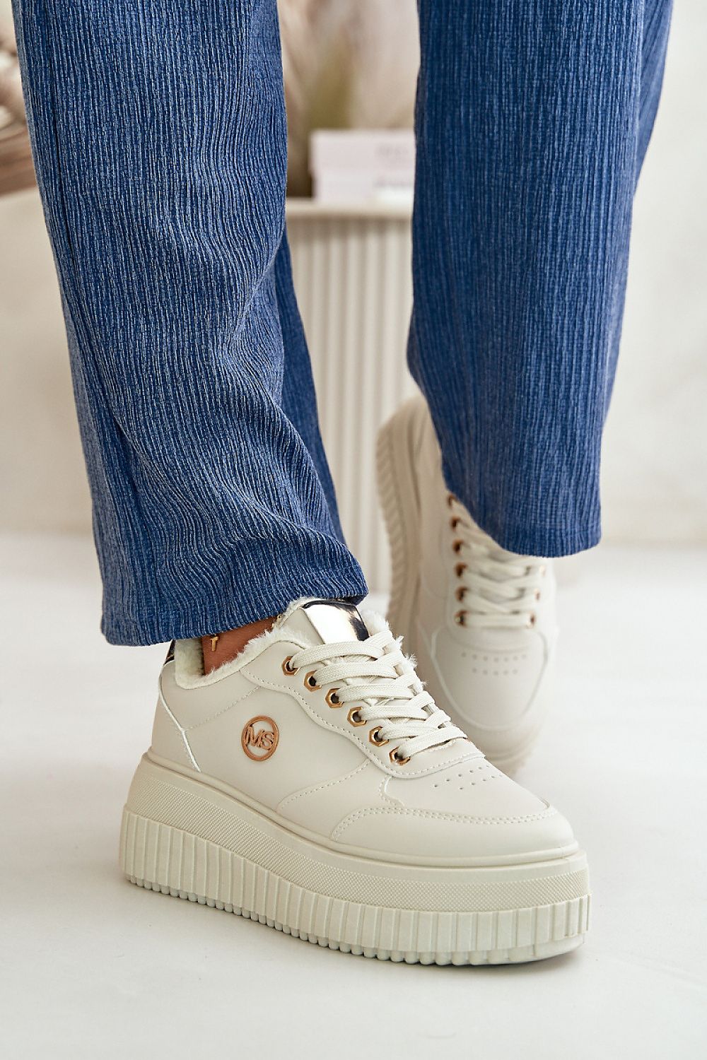 Elegant women's sport shoes from Step in Style made of eco-leather, boasting a warm fur lining and a 6cm platform for enhanced stability and comfort.