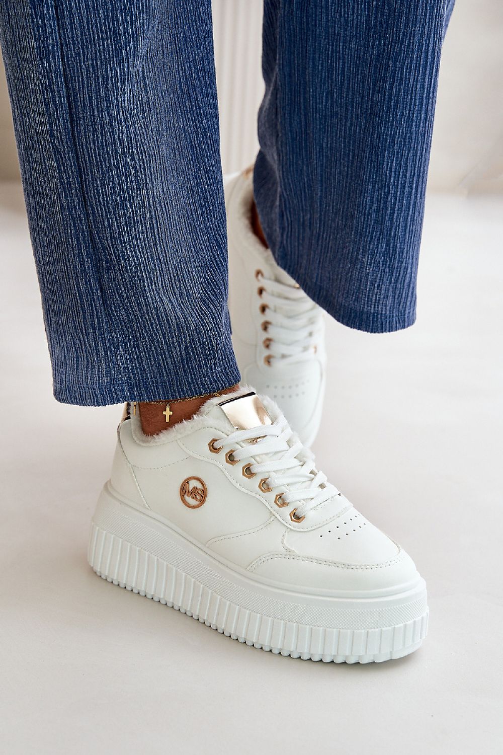 Elegant eco-leather sports shoes for women featuring a plush fur lining, perfect for stylish outdoor activities, crafted by Step in Style.