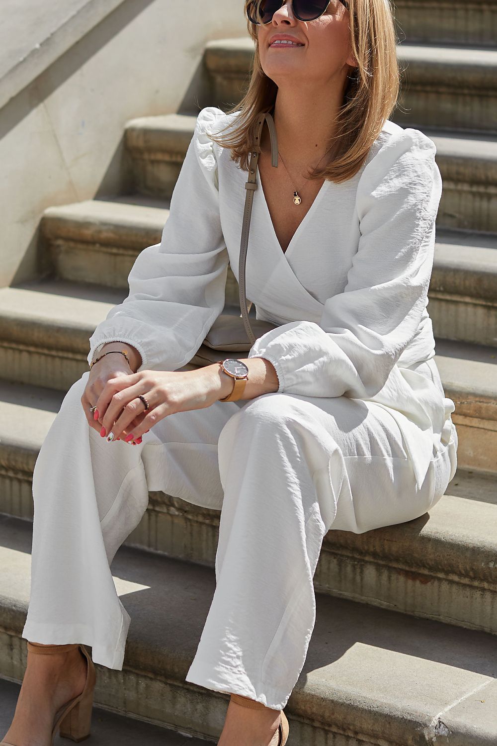 Close-up of La Aurora's sophisticated adjustable blouse from the formal set, showcasing luxurious fabric and exquisite detailing.