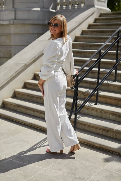 La Aurora high-waisted pants of the elegant formal set, designed with a smooth front and comfortable elasticated back for a perfect fit.