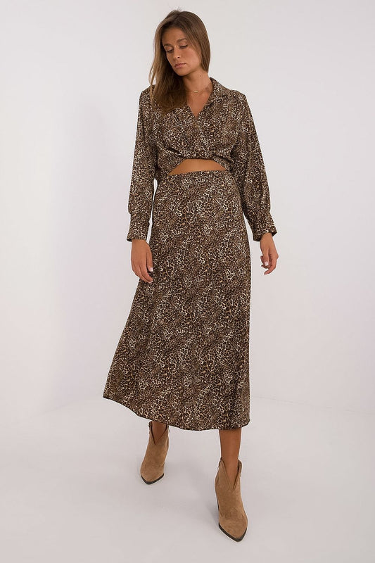 Luxurious women's animal motif set featuring a long sleeve blouse and elegant skirt, designed by Italy Moda, crafted from a soft polyester blend for ultimate comfort and style.