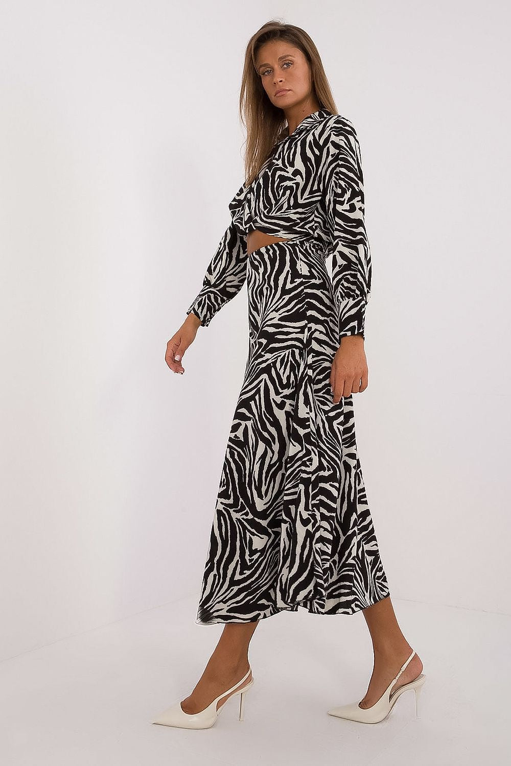 Close-up of the sophisticated long sleeve blouse from Italy Moda's elegant women's animal motif set, highlighting the wrap neckline and intricate detailing.
