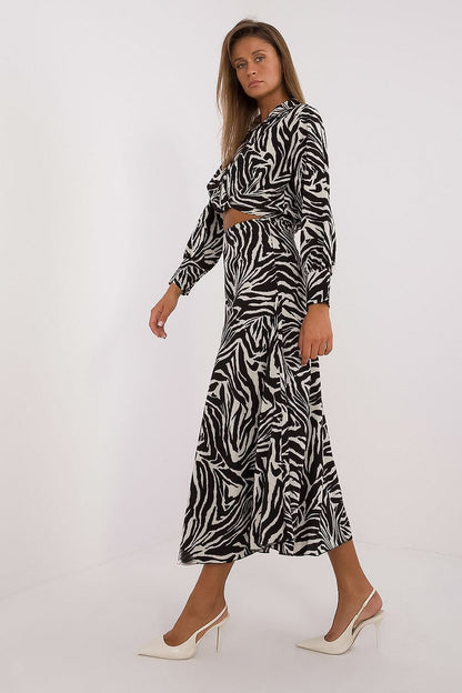 Close-up of the sophisticated long sleeve blouse from Italy Moda's elegant women's animal motif set, highlighting the wrap neckline and intricate detailing.