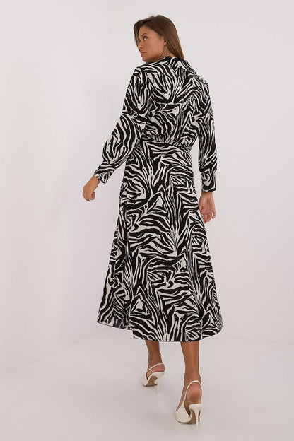 Chic skirt from the elegant women's animal motif set by Italy Moda, designed to pair seamlessly with the long sleeve blouse for a fashionable, comfortable outfit.