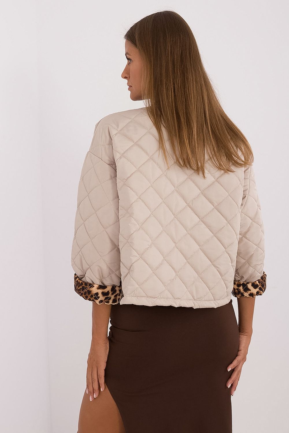 Elegant women's lightweight quilted jacket by Italy Moda featuring stylish animal motifs, perfect for casual autumn and spring fashion.