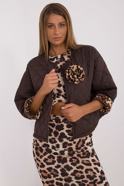 Chic close-up of the women's lightweight quilted jacket by Italy Moda, highlighting exquisite animal designs and fine details, ideal for transitional weather.