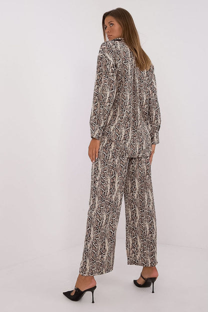 Wide-leg pants from the Italy Moda animal motif set, showcasing a high waist design that enhances the silhouette while providing luxurious comfort.