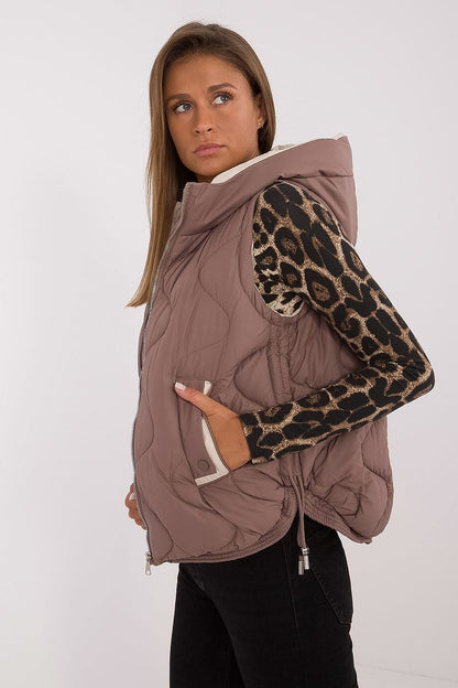 Close-up of the stylish collar and hood of MBM's luxury women's quilted down vest, highlighting its premium polyester material and fashionable details.