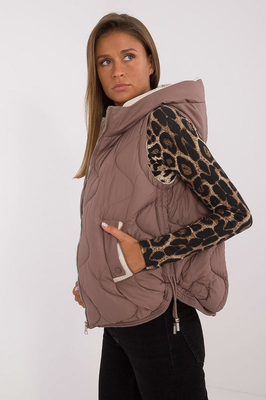 Close-up of the stylish collar and hood of MBM's luxury women's quilted down vest, highlighting its premium polyester material and fashionable details.