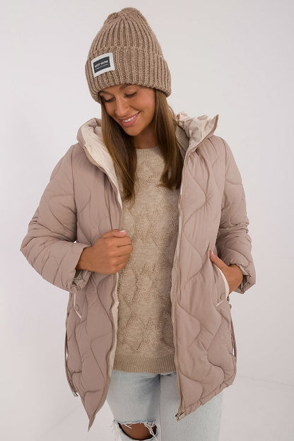 Luxury women's quilted jacket with hood by MBM, featuring lightweight polyester insulation ideal for autumn and winter wear.