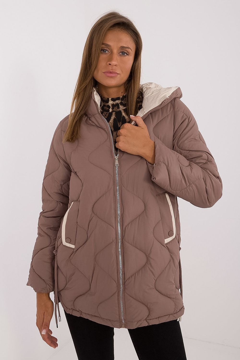 Luxurious MBM women's quilted jacket with hood, perfect for autumn and winter, designed for stylish warmth and comfort.