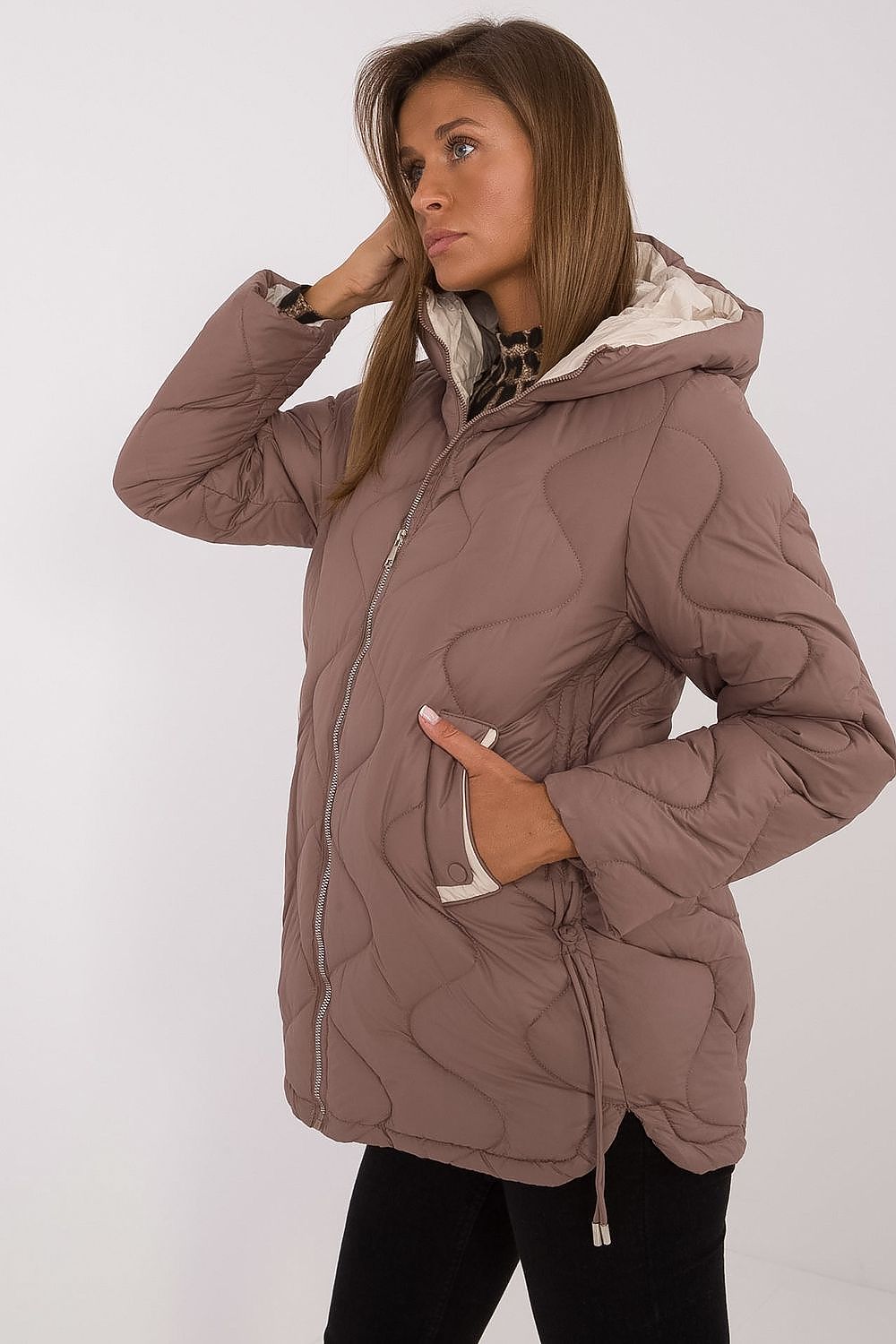 Elegant MBM women's quilted jacket showcasing a lightweight polyester insulation for a chic yet practical winter wardrobe.