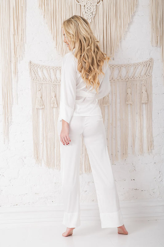 Close-up view of Kalimo's satin pajama set showcasing the delicate fabric and stylish design, ideal for a refined and feminine sleepwear collection.