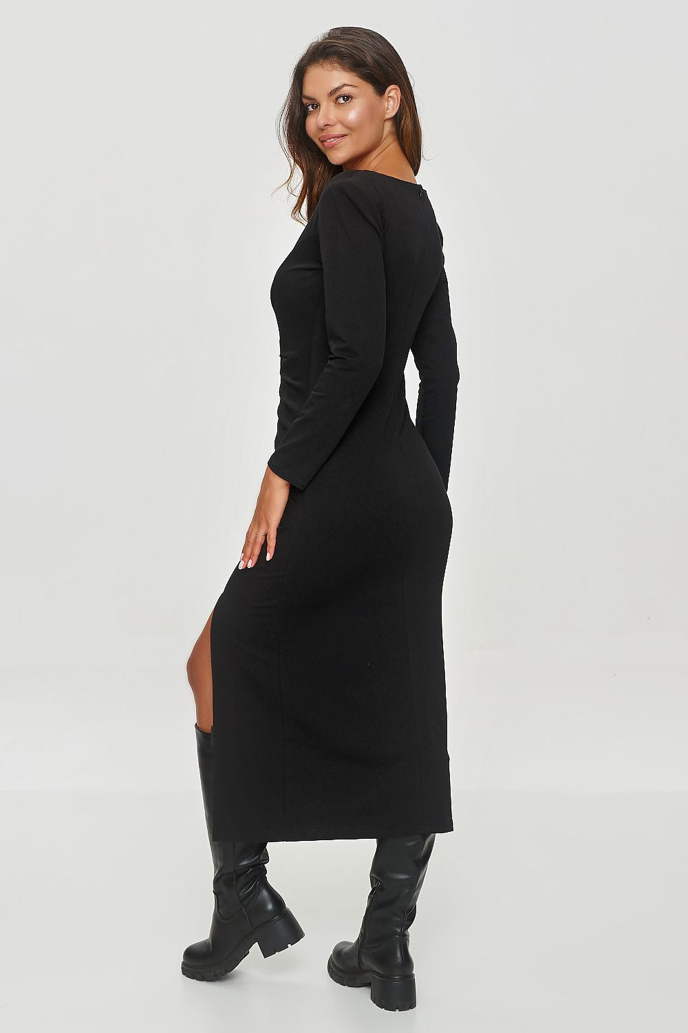 Elegant mid-calf day dress by Makadamia, showcasing a fitted silhouette, classic round neckline, and long sleeves, perfect for cooler days with a unique gathering detail at the hip for a slimming effect.