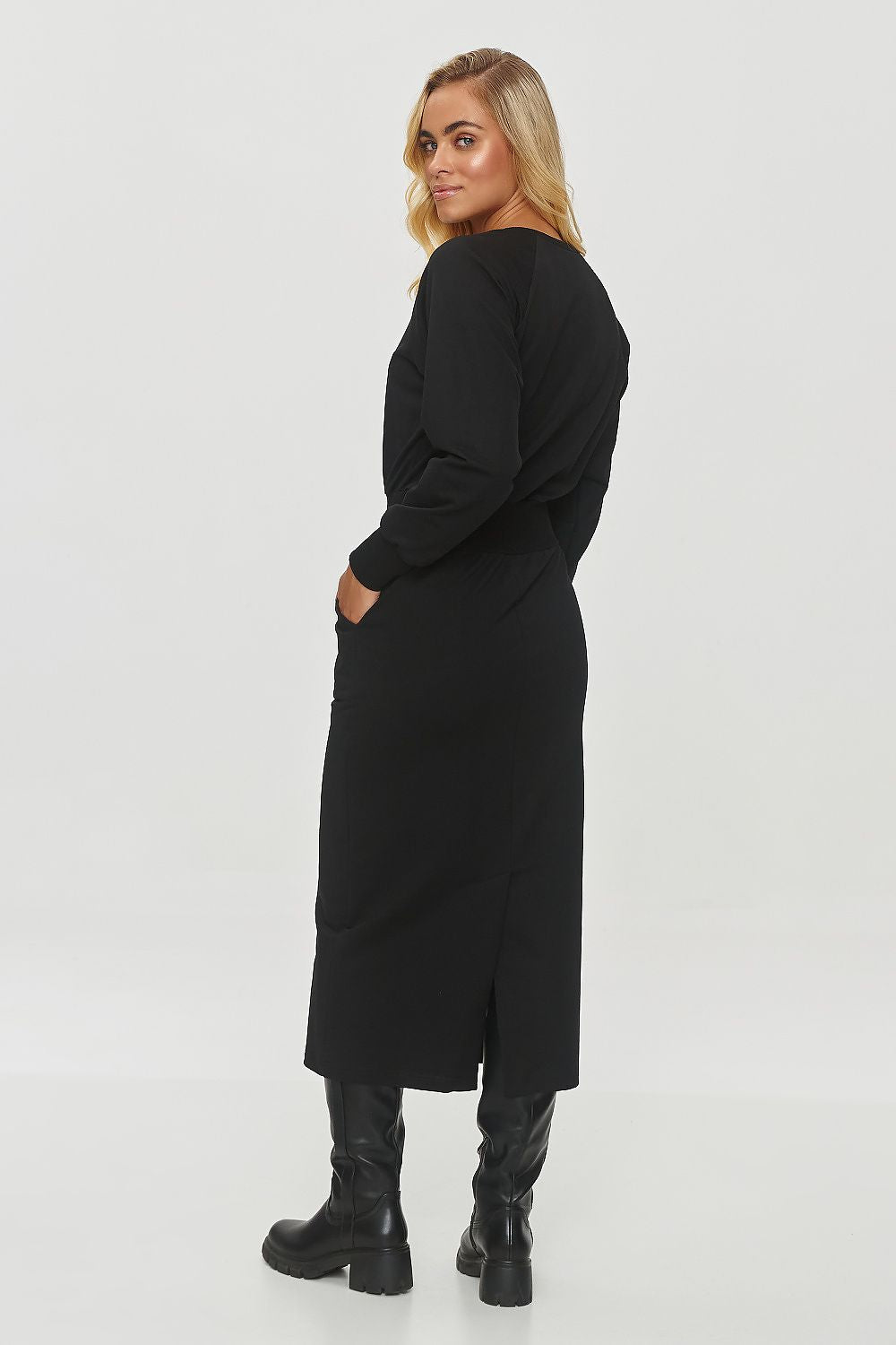 Luxurious Makadamia sweatshirt dress crafted from 95% cotton and 5% spandex, combining comfort with sophisticated style.