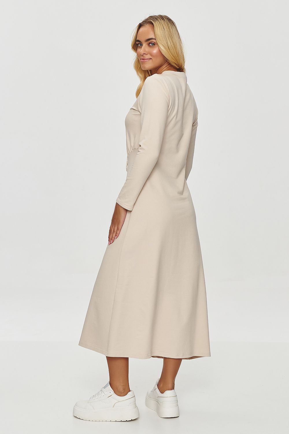 Elegant draped midi dress by Makadamia showcasing a subtle gathered waist detail and high neckline, perfect for chic occasions.