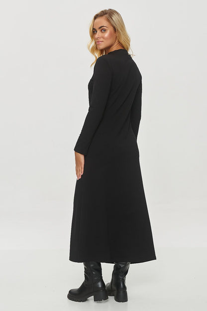 Sophisticated Makadamia midi dress: a timeless piece with draped fabric and elegant details for modern women's wardrobes.