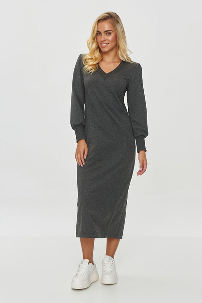 Elegant Makadamia midi daydress with V-neck and long sleeves, detailed with a subtle back slit, showcasing a luxurious style perfect for versatile occasions.