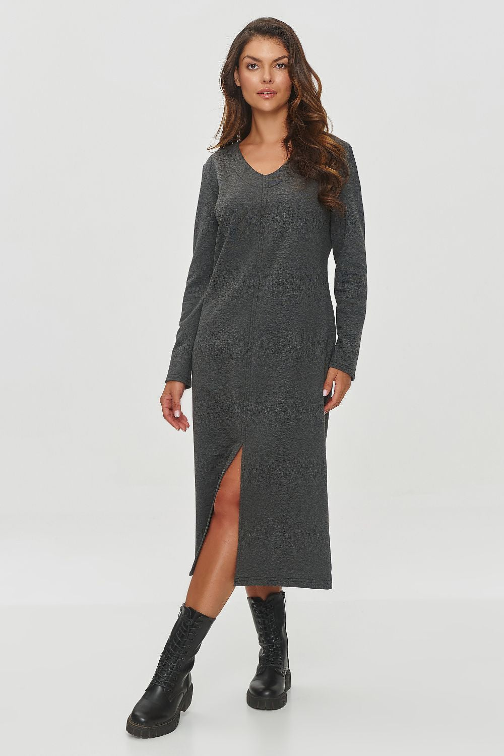 Elegant Makadamia V-Neck Sweatshirt Dress featuring soft cotton spandex material, showcasing a sophisticated body-hugging silhouette with a stylish slit for ease of movement.