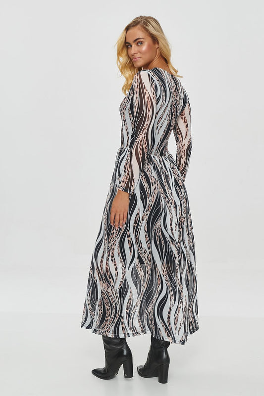 Beautifully fitted top of the long printed dress by Makadamia, accentuating the waist with unique plant and animal print patterns.