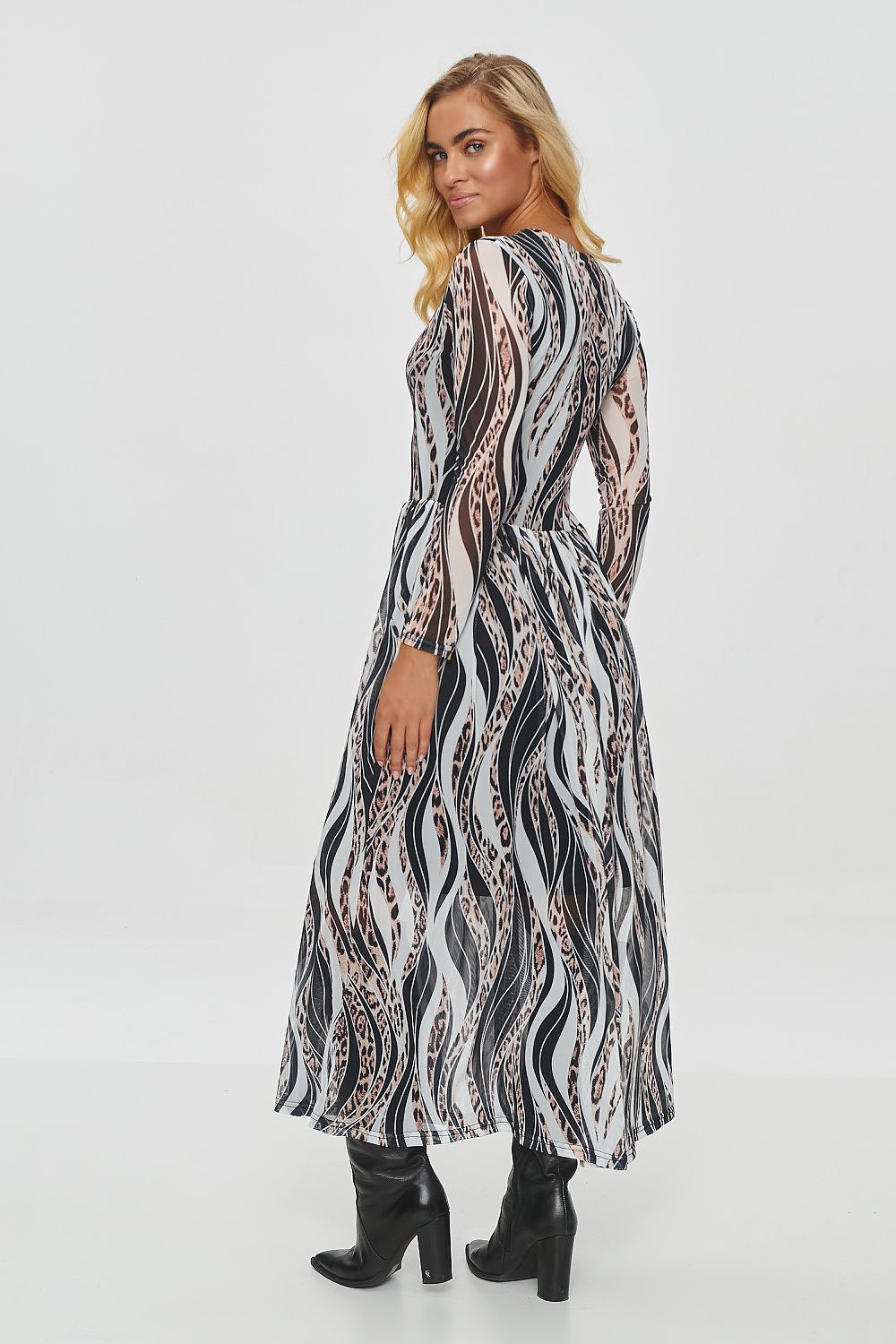 Beautifully fitted top of the long printed dress by Makadamia, accentuating the waist with unique plant and animal print patterns.