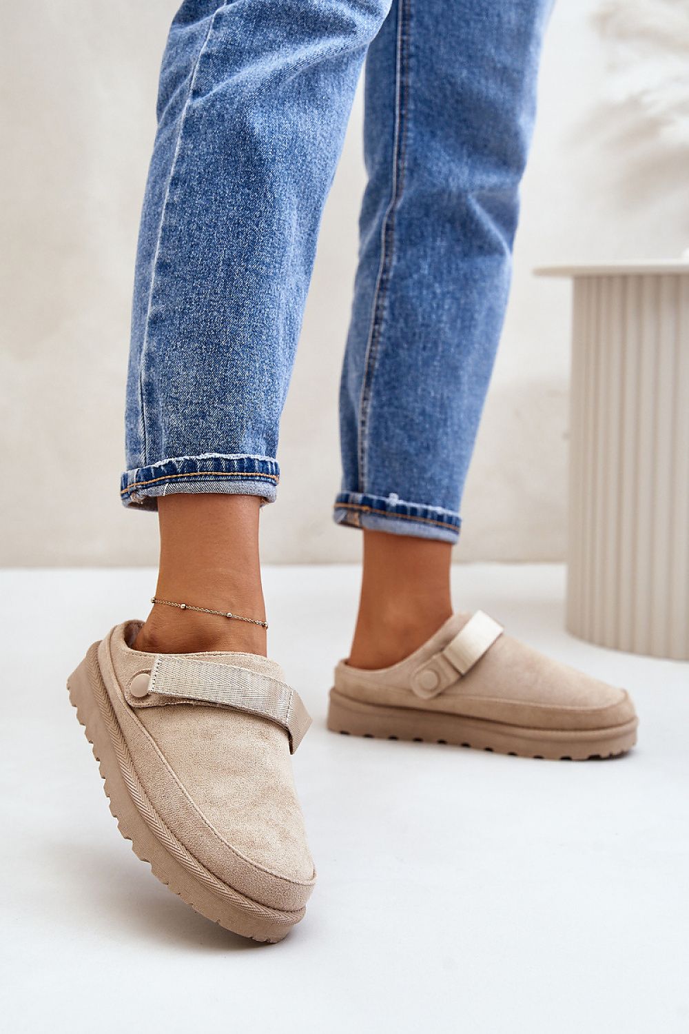 Elegant women's eco suede slippers by Step in Style with removable Velcro strap and plush fur lining, designed for comfort and style.