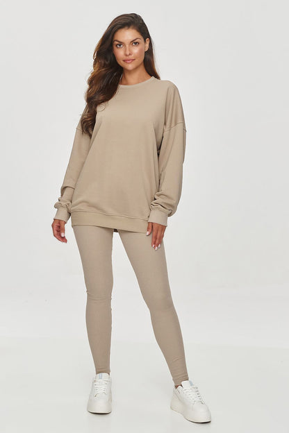 Luxurious loose-fit sweatshirt by Makadamia, showcasing a soft cotton blend material and adjustable ribbed neckline, perfect for a chic, casual look.
