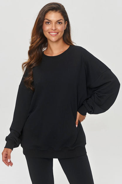 Detail of adjustable ribbed neckline on the luxury Makadamia sweatshirt, highlighting the sophisticated design and versatility for year-round wear.